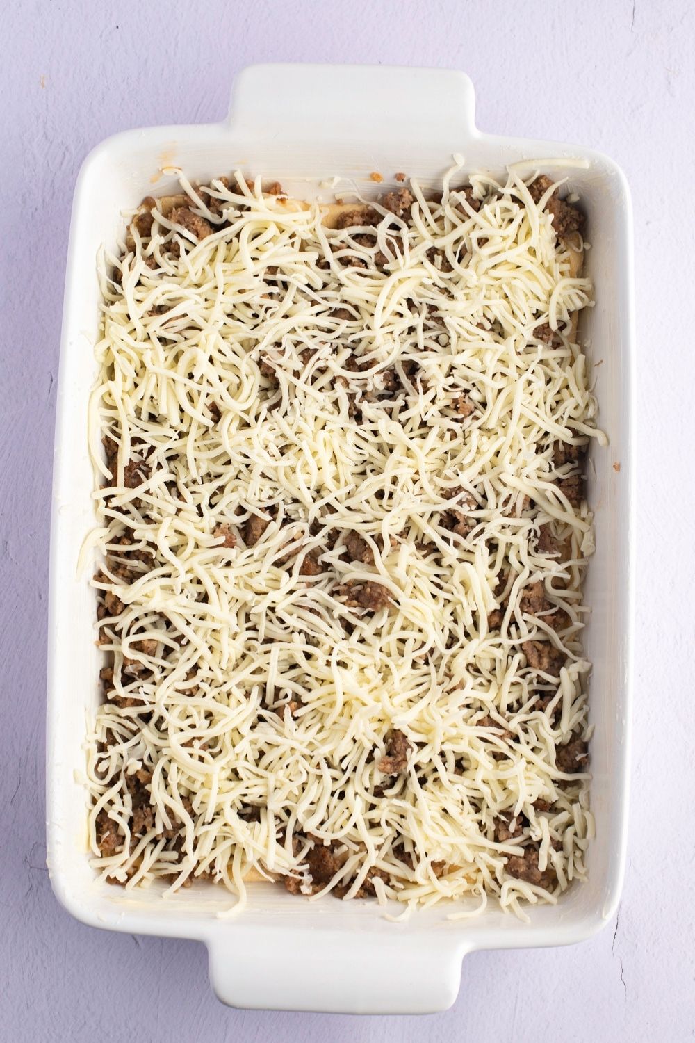 Ground Pork Sausage and Shredded Cheese in a Casserole