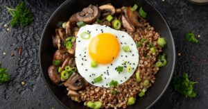 Homemade Cooked Buckwheat with Eggs, Mushrooms and Onions