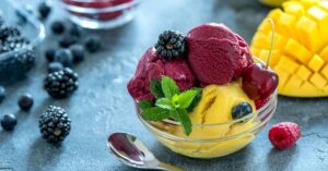Homemade Sweet Blackberry and Mango Sorbet in a Glass Bowl