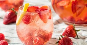 Refreshing Strawberry Punch with a Slice of Lemon
