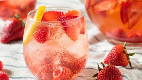 Refreshing Strawberry Punch with a Slice of Lemon
