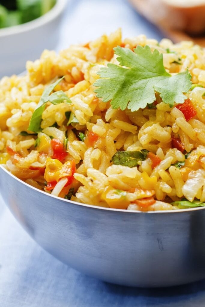 20 Saffron Recipes To Elevate Your Next Meal featuring Saffron Rice Pilaf in a Bowl