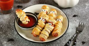 Spooky Sausage Mummies with Ketchup