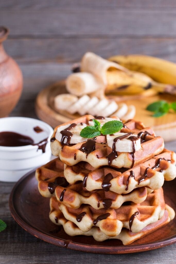 Tender and Fluffy Banana Waffles with Chocolate Syrup