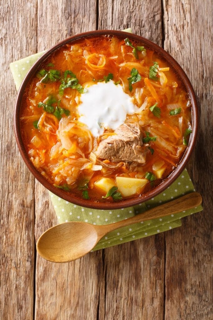 Traditional Russian Soup Shchi with Beef and Sour Cream