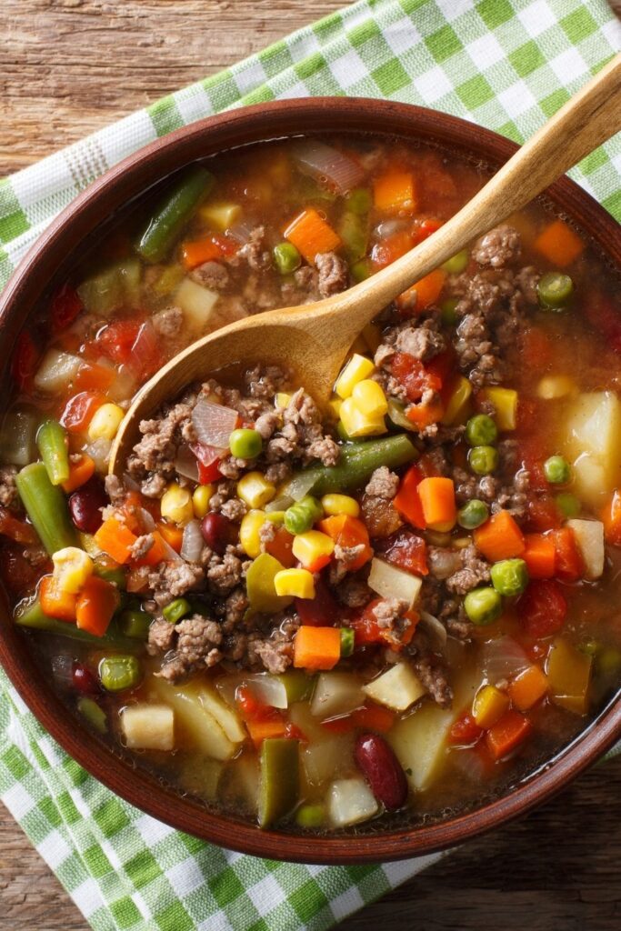 Warm Beef and Vegetable Soup with Corn, Carrots and Beans