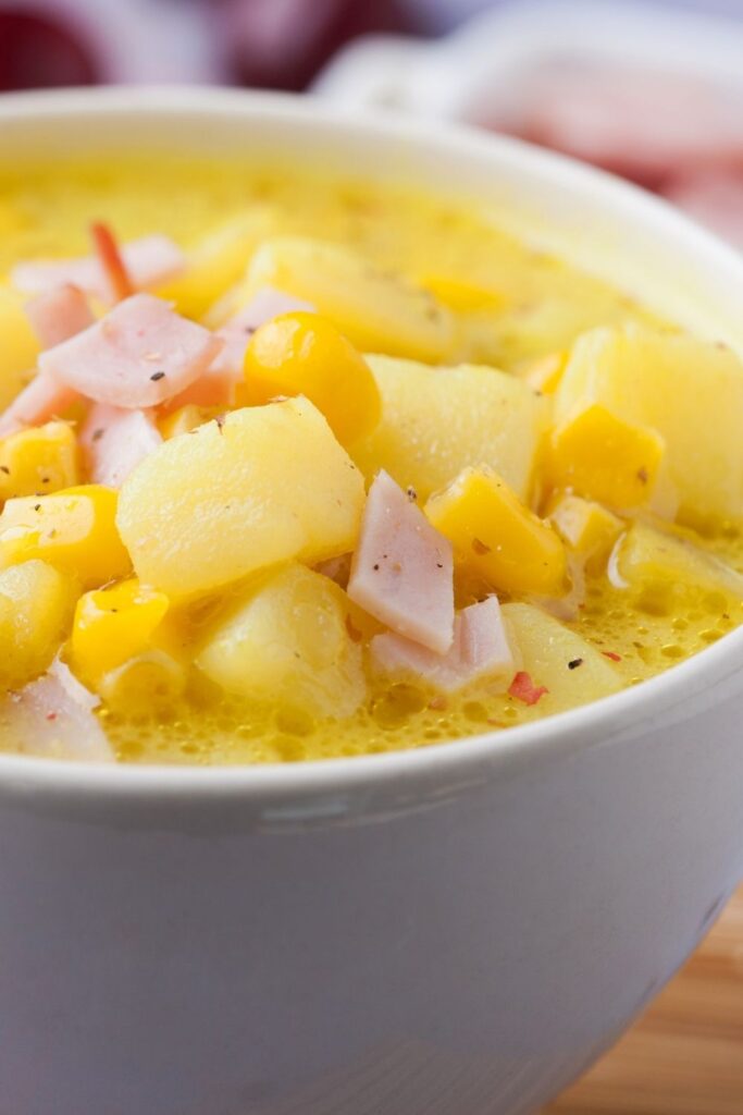 15 Simple Ham Soup Recipes for a Rainy Day including Warm Ham and Potato Soup in a Bowl