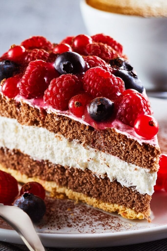 Cake Filling Ideas (+ Easy Recipes) featuring A Slice of Berry Cake with Layered Cream