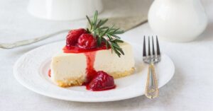 A Slice of Sweet Homemade New York Cheesecake in a Plate