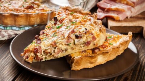 A slice of Quiche Lorraine with Bacon and Cheese