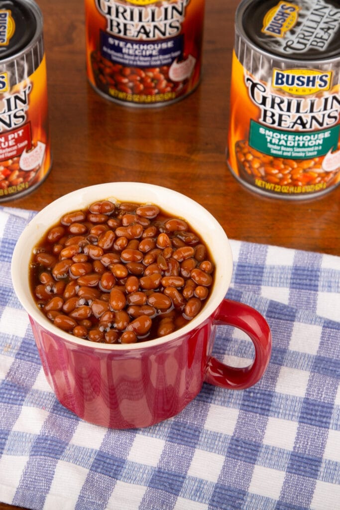 Bush's Baked Beans on a red mug