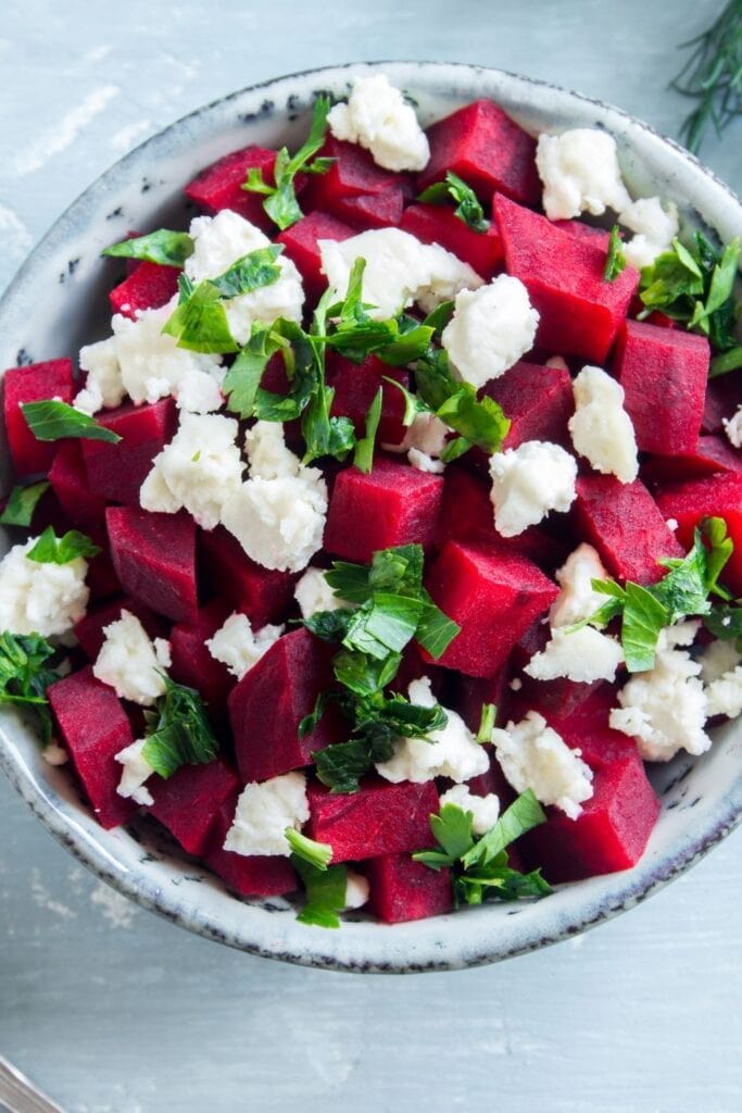 Bowl of Beet Salad with Feta Cheese and Herbs