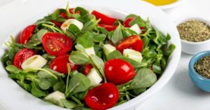 Bowl of Homemade Purslane salad with Tomatoes and Cheese