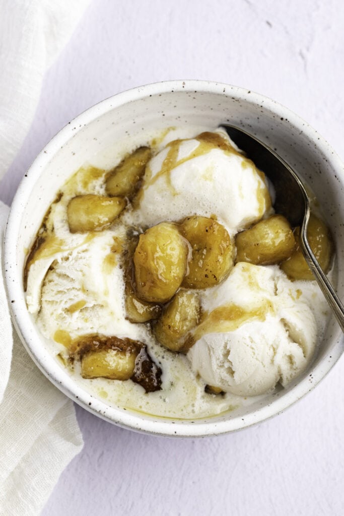 Caramelized Bananas on Top of Creamy Vanilla Ice Cream in a Bowl