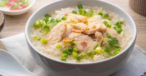 Chicken Congee with Onions in a Bowl