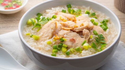 Chicken Congee with Onions in a Bowl