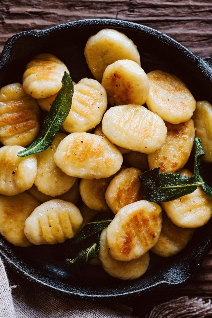 Cooked Gnocchi with Sage in a Skillet