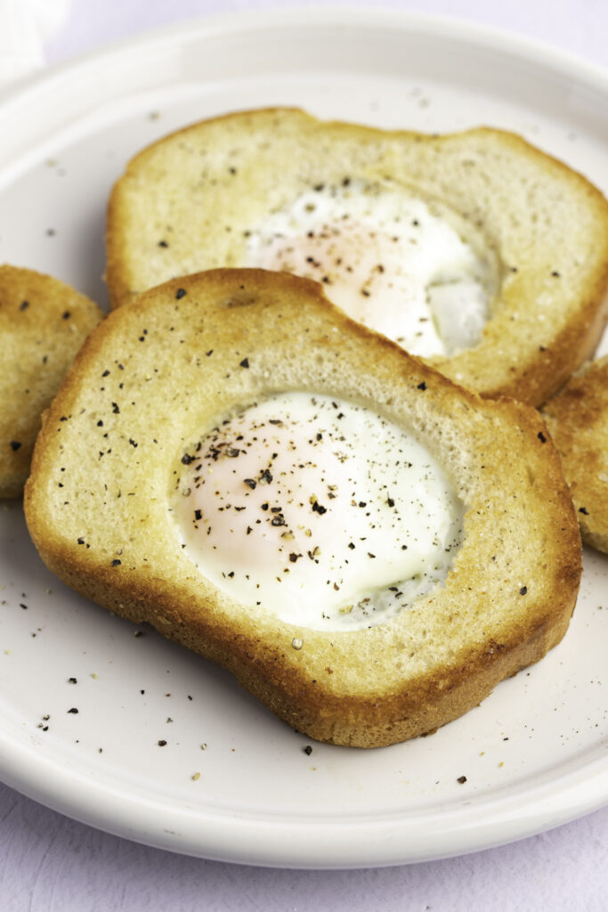 Eggs In A Basket Topped With Pepper 