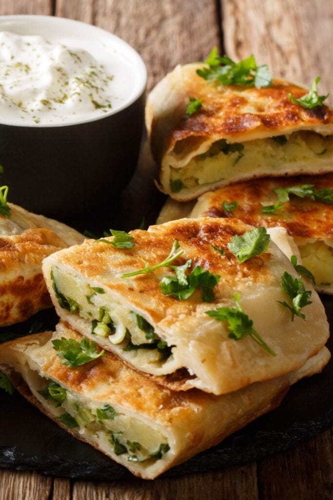33 Best Ramadan Recipes featuring Flatbread Bolani with Green Onions and Potatoes