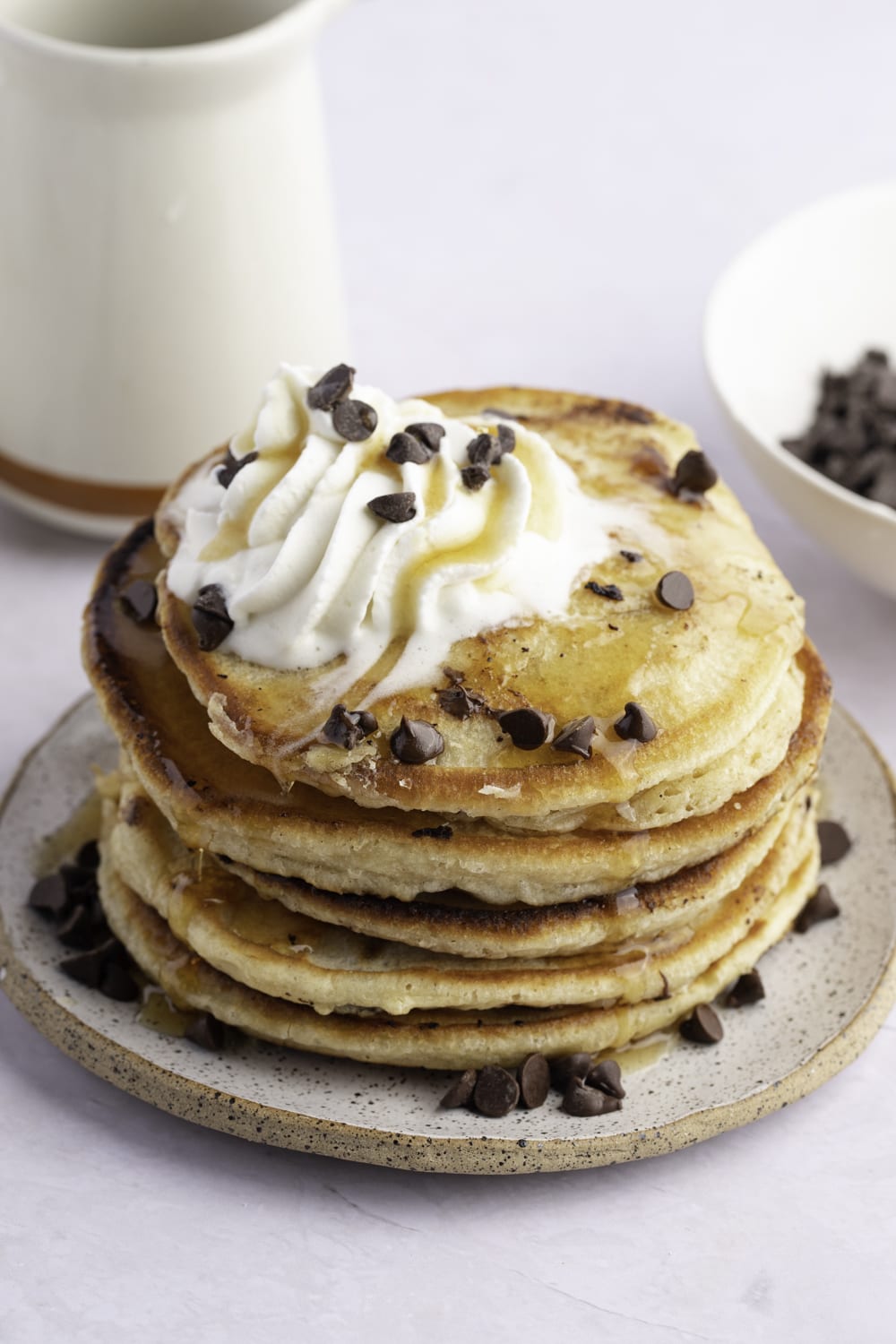 Chocolate Chip Pancakes Topped With Whipped Cream 