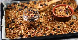 Granola on a Baking Sheet and Small Container