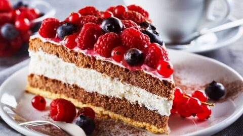 Homemade Berry Cake with Layered Cream in a Plate