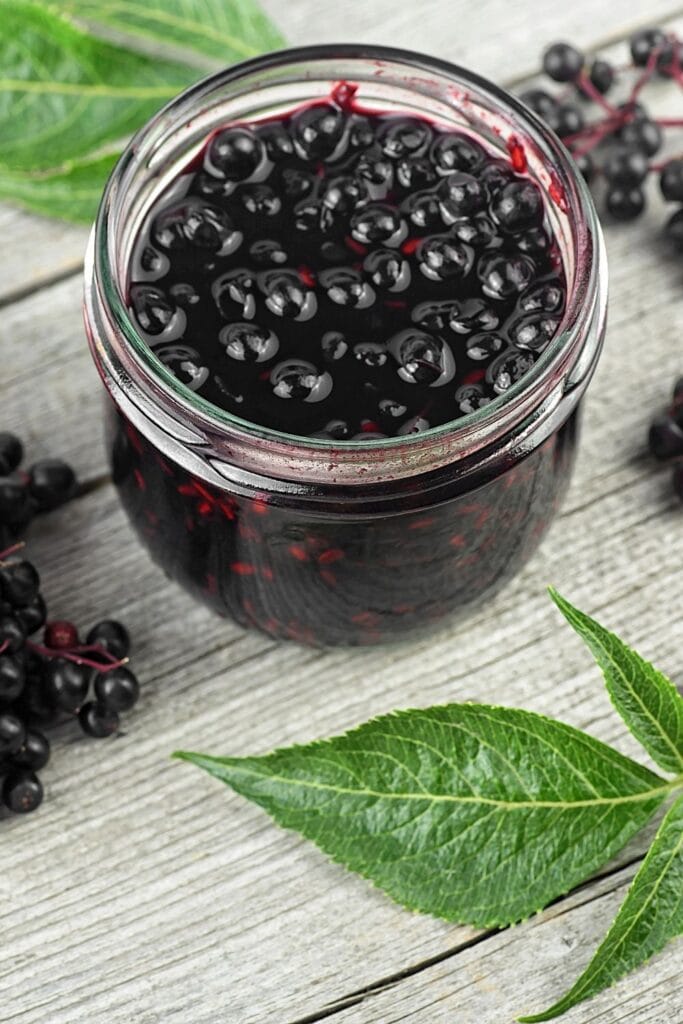 Homemade Black Elderberry Syrup in a Glass Jar