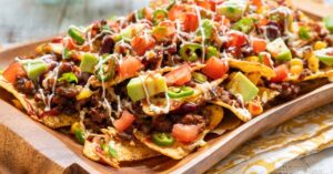 Homemade Loaded Nachos with Tortilla Chips, Avocados and Tomatoes