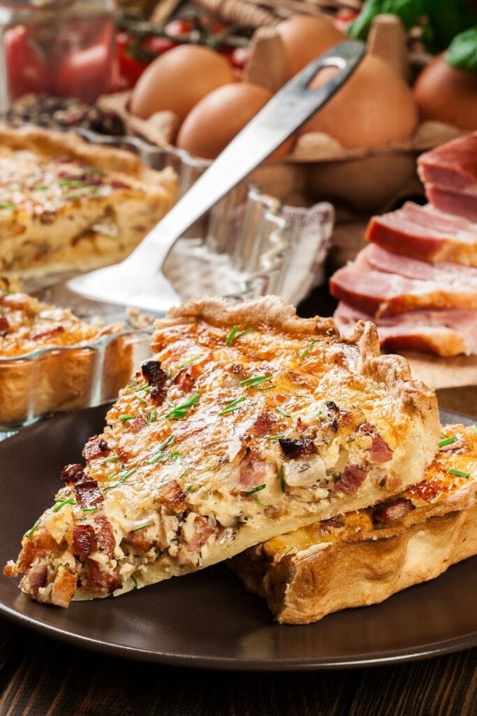 25 Easy Quiche Recipes for Any Occasion featuring Homemade Quiche Lorraine with Bacon and Cheese