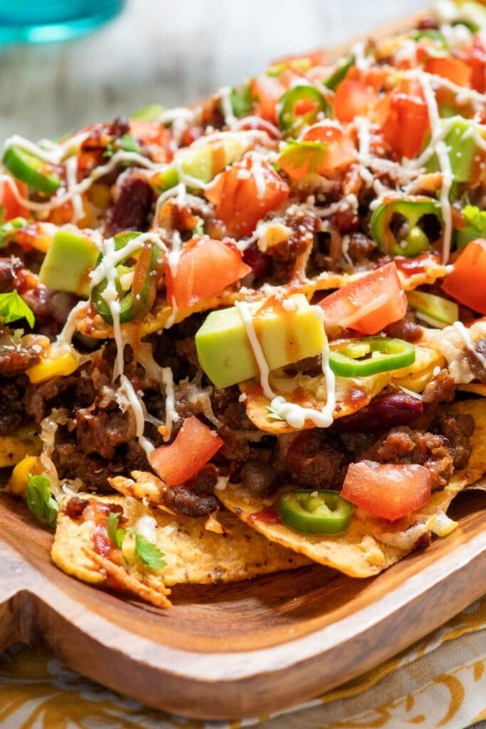 Loaded Nachos with Avocados, Guacamole and Tomatoes