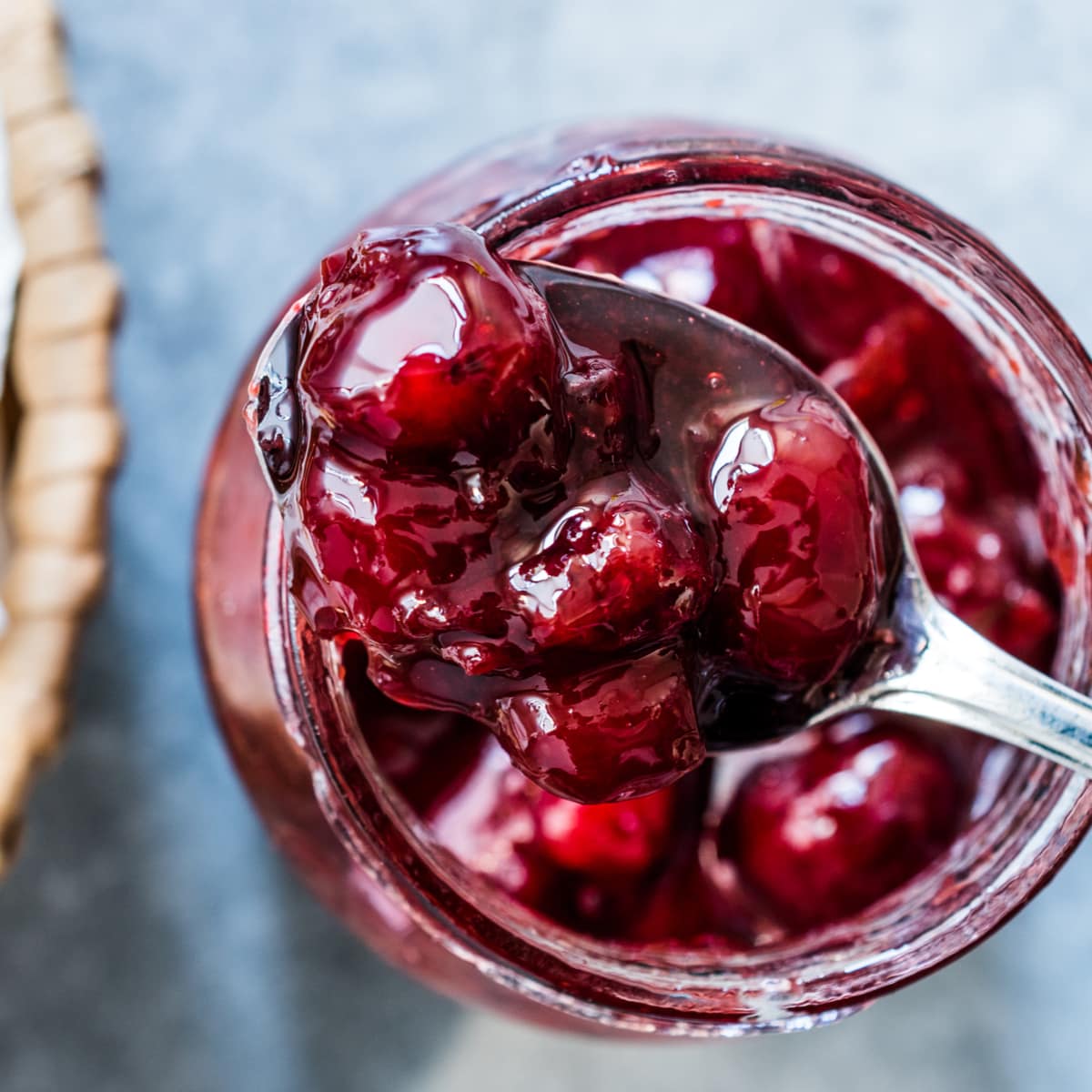 Ocean Spray Cranberry Sauce Scooped by a Spoon From a Glass Jar