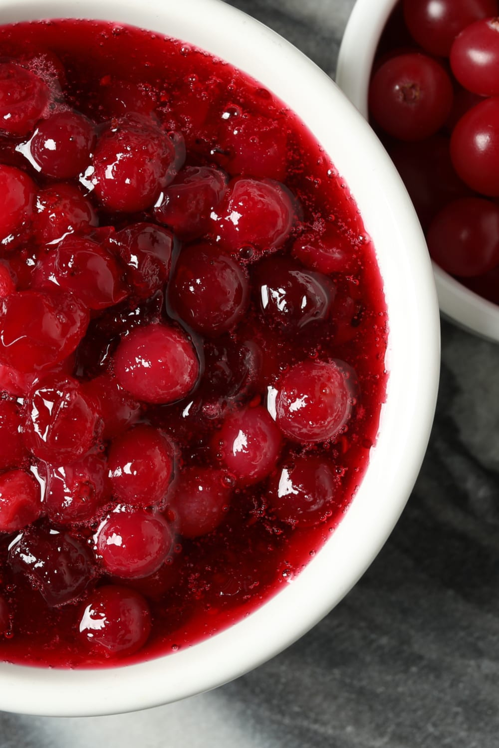 Cranberry sauce in a white bowl.