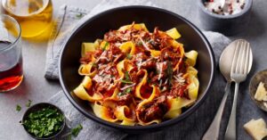 Pappardelle Pasta with Beef in a Bowl