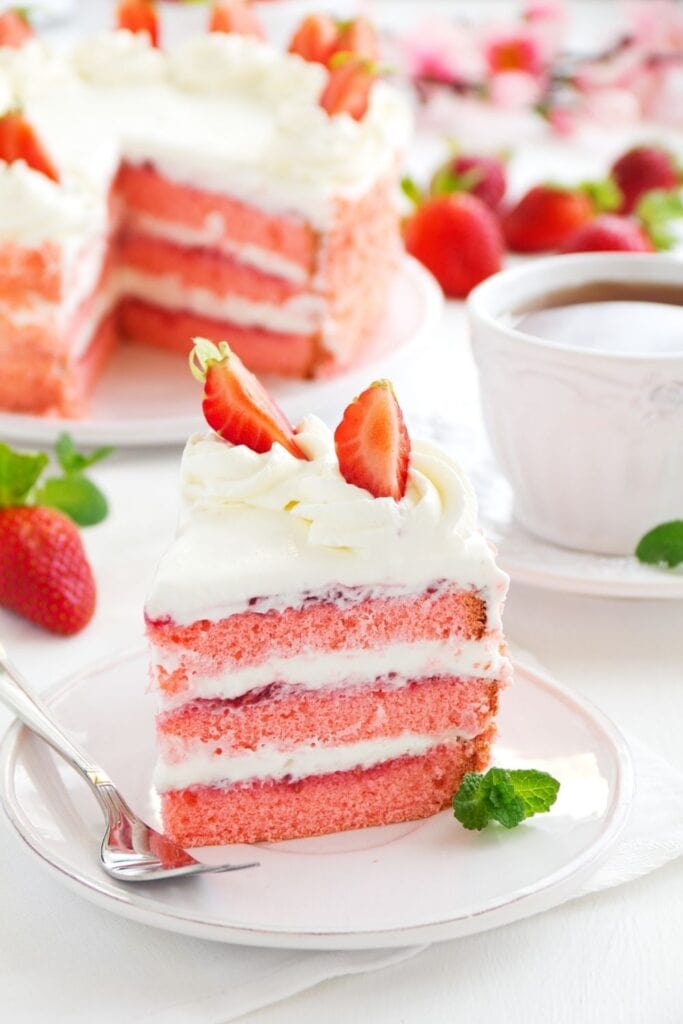 Sweet Strawberry Cake with Icing and Fresh Strawberries