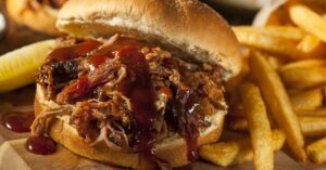 Tasty Homemade Pulled Pork Sandwich with Fries