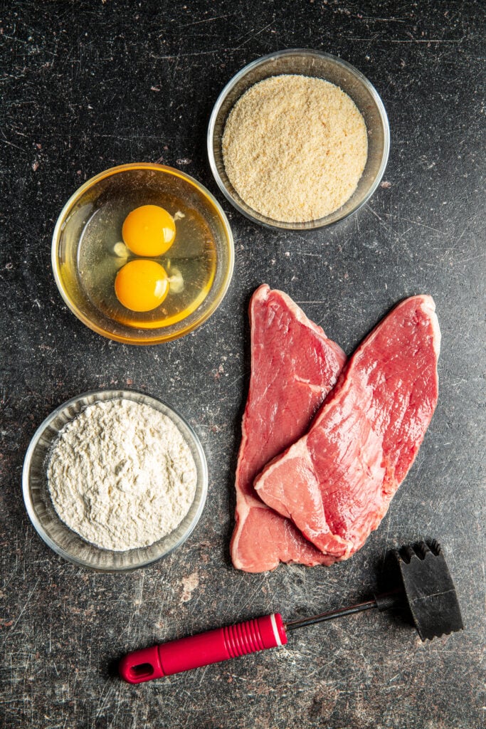 Wiener Schnitzel Ingredients: breadcrumbs, eggs, flour, veal cutlets
