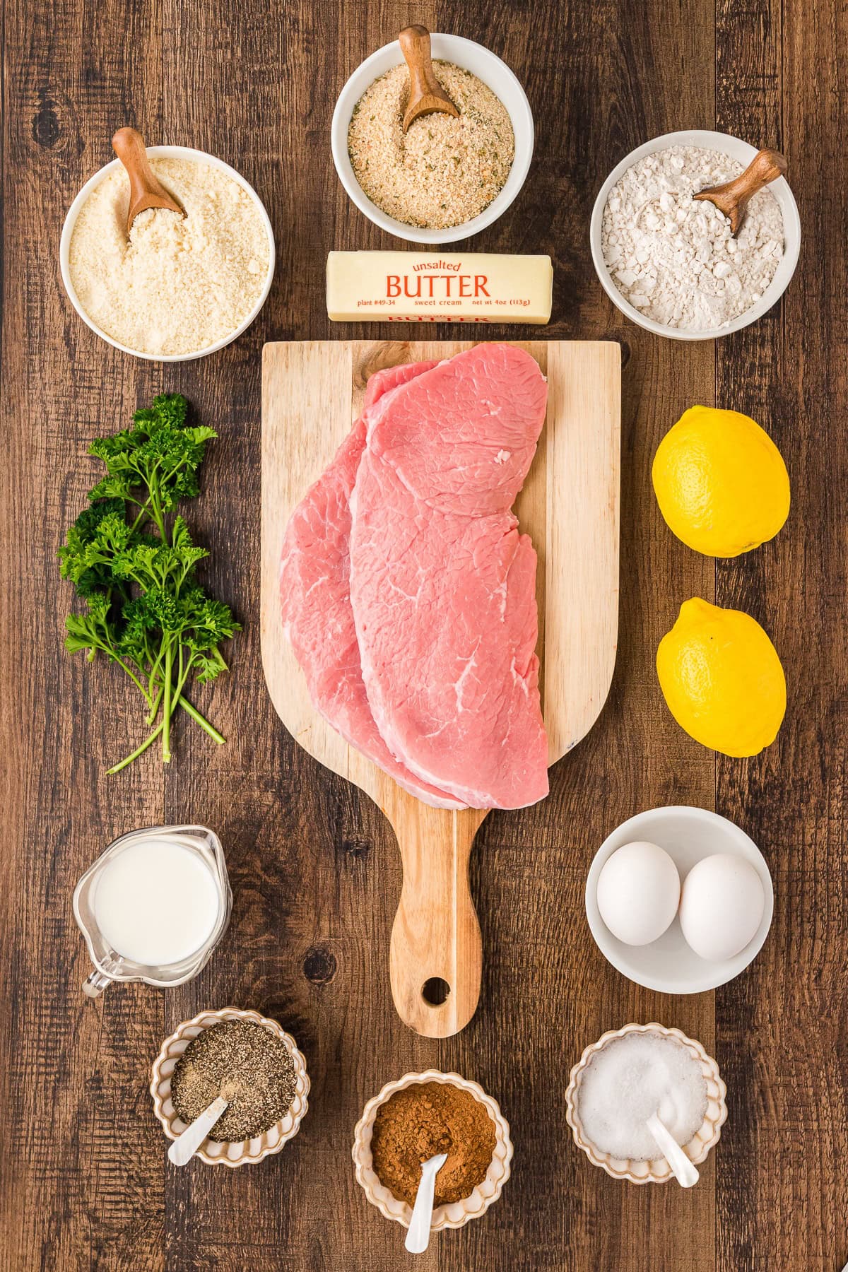 Wiener Schnitzel Ingredients: veal, breadcrumbs, butter, lemon slices and parsley