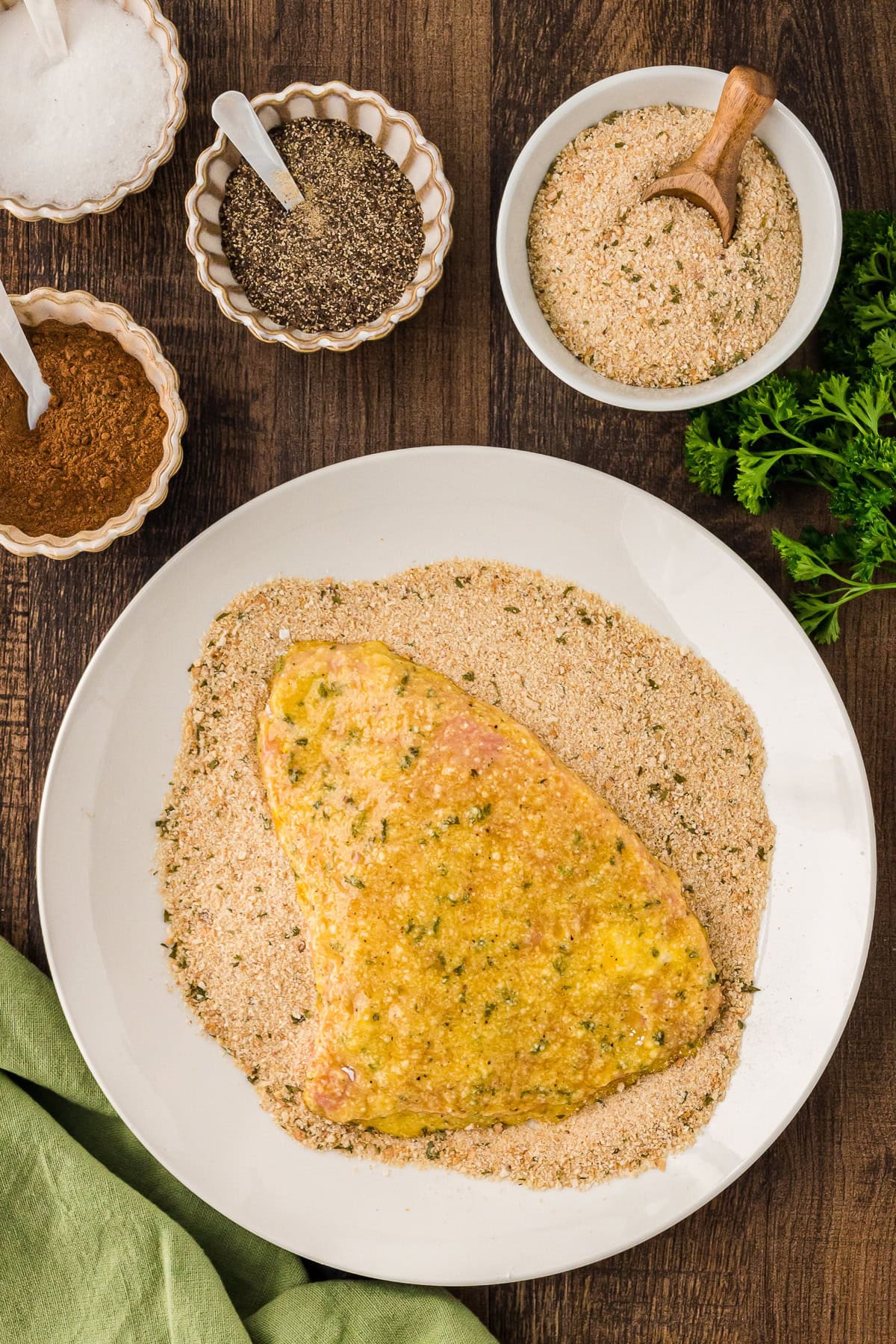 Battered veal cutlet and breadcrumbs in a plate