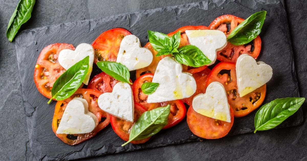 Appetizing Caprese Salad with Tomatoes and Heart-Shaped Cheese