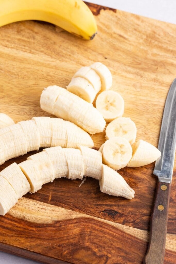 Banana Slices in a Wooden Cutting Board