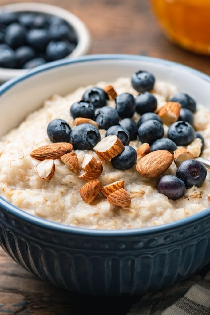 25 Easy Porridge Recipes featuring a Bowl of Oatmeal Porridge with Nuts and Blueberries