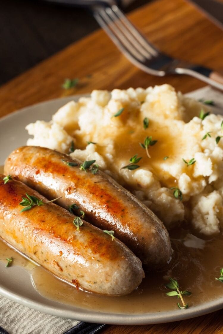 25 Best Bratwurst Recipes For Grilling Season Insanely Good   Homemade Bratwurst With Mashed Potatoes 750x1125 