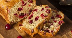 Homemade Cranberry Bread in a Wooden Cutting Board