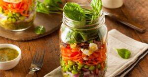 Homemade Mason Jar Salad with Egg, Bacon and Vegetables