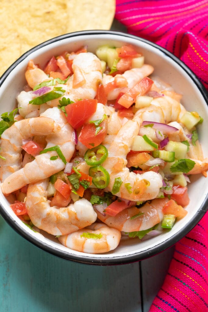 Homemade Mexican Shrimp Ceviche Served in a Bowl with Tomatoes and Jalapeños