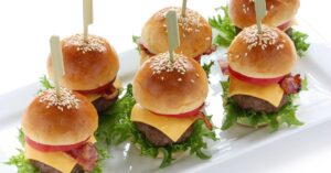 Homemade Mini Burgers with Cheese and Sesame Seeds