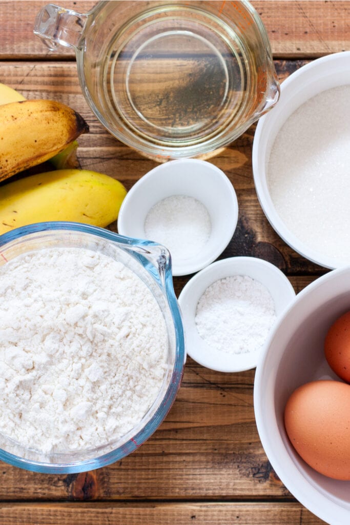 Martha Stewart's Banana Bread Ingredients: Butter, Sugar, Eggs, Flour, Baking Soda, Salt, Ripe Bananas, Sour Cream, Vanilla, Nuts, and Chocolate Chips
