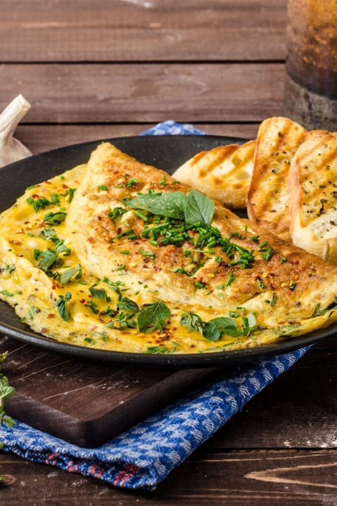 Chive Recipes featuring a Fluffy Omelette with Chives, Spices, and Grilled Bread