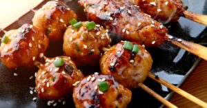 Saucy Grilled Meatballs with Sesame Seeds