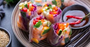 Spring Rolls with Carrots, Celery, Shrimp and Hot Sauce